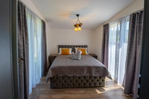 Postel nebo postele na pokoji v ubytování Ungefug A-Frame Sighisoara