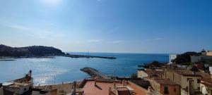 a view of the ocean from a city with buildings at LLOGUER30 Garbí Love, vistas espectaculares del mar in Sant Feliu de Guixols