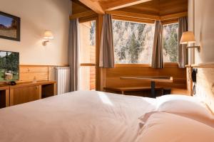 Posteľ alebo postele v izbe v ubytovaní Hotel Garni Pegrà