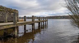 a dock on a body of water at Mill Cottage in Sawrey