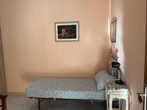 Un pat sau paturi într-o cameră la Villa Margherita