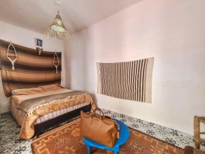 Postel nebo postele na pokoji v ubytování Riad MIYA