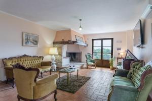 Posezení v ubytování Villa Montepescini
