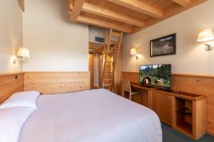 TV a/nebo společenská místnost v ubytování Hotel Garni Pegrà