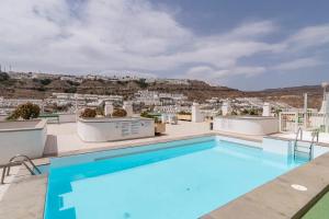 Bazén v ubytovaní Sol y Mar Puerto Paraiso alebo v jeho blízkosti