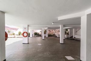 Posilňovňa alebo fitness centrum v ubytovaní Sol y Mar Puerto Paraiso