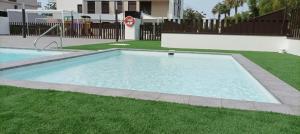 Bazén v ubytování Residencial El Trenet 2A nebo v jeho okolí