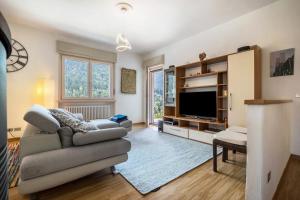TV a/nebo společenská místnost v ubytování Villa Vittoria Mountain View