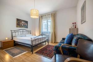 Postel nebo postele na pokoji v ubytování Villa Vittoria Mountain View