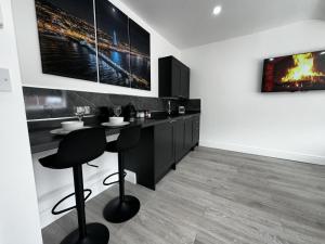 Kuchyň nebo kuchyňský kout v ubytování new osborne luxury Hottub and jacuzzi suites