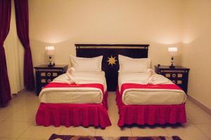 Cama o camas de una habitación en Merfal Monthly Apartments