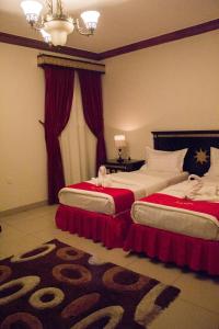 Cama o camas de una habitación en Merfal Monthly Apartments