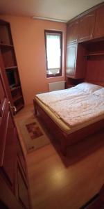 Postel nebo postele na pokoji v ubytování Anne apartman Siófok + 5 fotografií