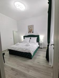 Ένα ή περισσότερα κρεβάτια σε δωμάτιο στο Iris's apartament