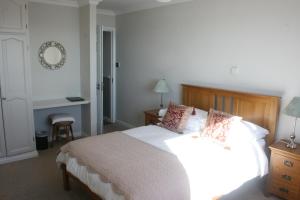 Voodi või voodid majutusasutuse Roundstone House Hotel toas