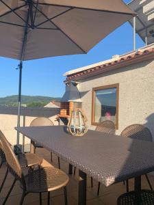 Balkón alebo terasa v ubytovaní "SANXENXO HOLIDAYS" ATICO CON GARAJE, BARBACOA y PISCINA A 5 MIN DEL CENTRO