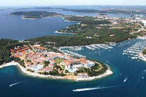 an aerial view of a resort in a harbor at Lovely guest house Veli Vrh in Pula