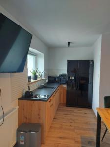 Pokoje i apartamenty MatDar的厨房或小厨房