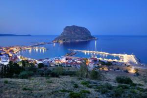 a view of a harbor at night at Casa dell’ est in Monemvasia