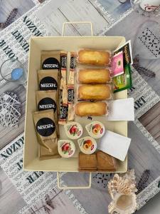 a lunch box filled with food and other food items at Fonzi’s House in La Spezia