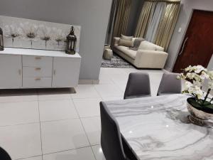 Posezení v ubytování Kings view exclusive villas (KVEV)