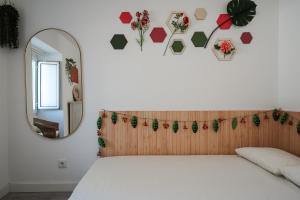 Cama ou camas em um quarto em Casa das Andorinhas