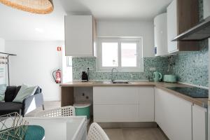 A cozinha ou cozinha compacta de Casa das Andorinhas