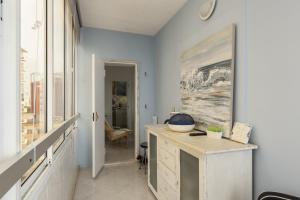 a bathroom with a counter with a bowl on it at Horizonte - Sea view by HD PROPERTIES in Quarteira