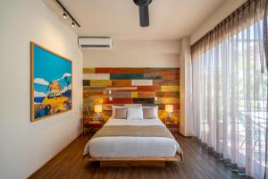 Postel nebo postele na pokoji v ubytování Mayan Monkey Cancun - Social Hotel