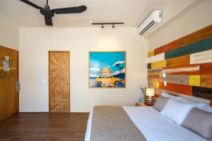 Letto o letti in una camera di Mayan Monkey Cancun - Social Hotel