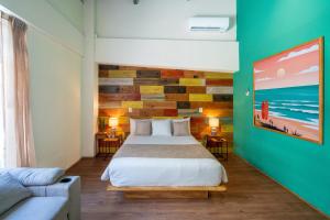 Letto o letti in una camera di Mayan Monkey Cancun - Social Hotel