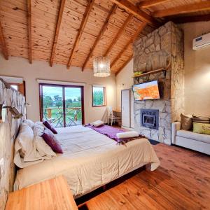 Una cama o camas en una habitación de Cabañas del Espinillo