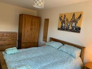 Sleeps 8 Matlock/ Matlock Bath Pet Friendly客房内的一张或多张床位