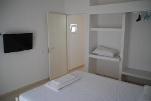 Postel nebo postele na pokoji v ubytování Soula appartments