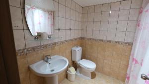 Koupelna v ubytování Agora Boutique Apart Hotel