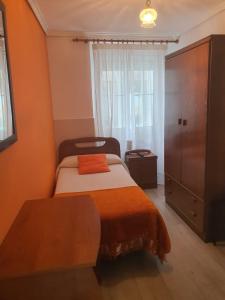 Postel nebo postele na pokoji v ubytování Hotel Abrego Reinosa