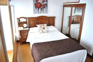 Postel nebo postele na pokoji v ubytování Hotel Abrego Reinosa