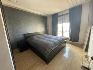 Postel nebo postele na pokoji v ubytování APPARTEMENT HAUT STANDING proche gare casa voyageur