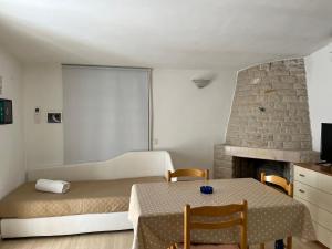 Televízia a/alebo spoločenská miestnosť v ubytovaní Viestemare Resort & SPA