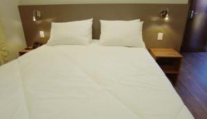 Ліжко або ліжка в номері Hotel Real Garden