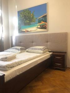 Posteľ alebo postele v izbe v ubytovaní P&J Apartamenty Św. Krzyża
