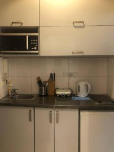 Kuchyňa alebo kuchynka v ubytovaní P&J Apartamenty Św. Krzyża
