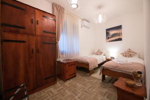 En eller flere senger på et rom på Gardoš rooms