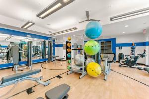 a gym with cardio equipment and exercise equipment at East Atlanta Retreat Haven of Fun and Comfort! in Atlanta