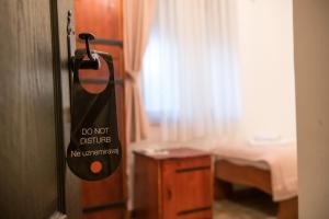 En eller flere senger på et rom på Gardoš rooms
