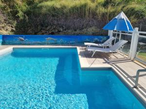 Πισίνα στο ή κοντά στο Villa Stone pour 8 personnes, piscine chauffée 5 euros par jour, accès PMR, 5 étoiles