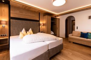 Postel nebo postele na pokoji v ubytování Hotel Schlosshof