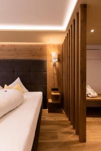Postel nebo postele na pokoji v ubytování Hotel Schlosshof
