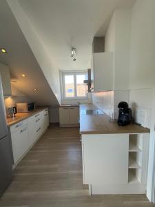 Kuchyň nebo kuchyňský kout v ubytování Ferienwohnung MaRe