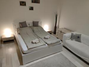 Katil atau katil-katil dalam bilik di Smart Apartment 2 +36 gambar